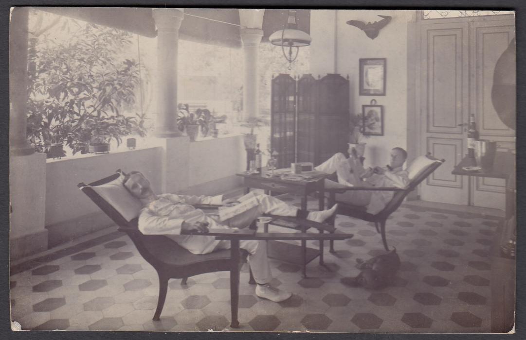 NETHERLANDS INDIES: (Picture Stationery) 1911 5c. card with fine photographic image of colonists relaxing on terrace, used from Soerabaja to Bath, England.