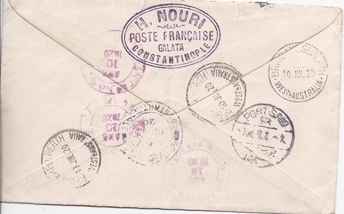 British Levant 1920 registered cover, an Ottoman 20pa stationery envelope used, to Perth, Western Australia, franked unoverprinted Great Britain 2d and 2½d. tied British P.O. Constantinople date stamp, redirected from Perth to USA. Envelope opened out for display.