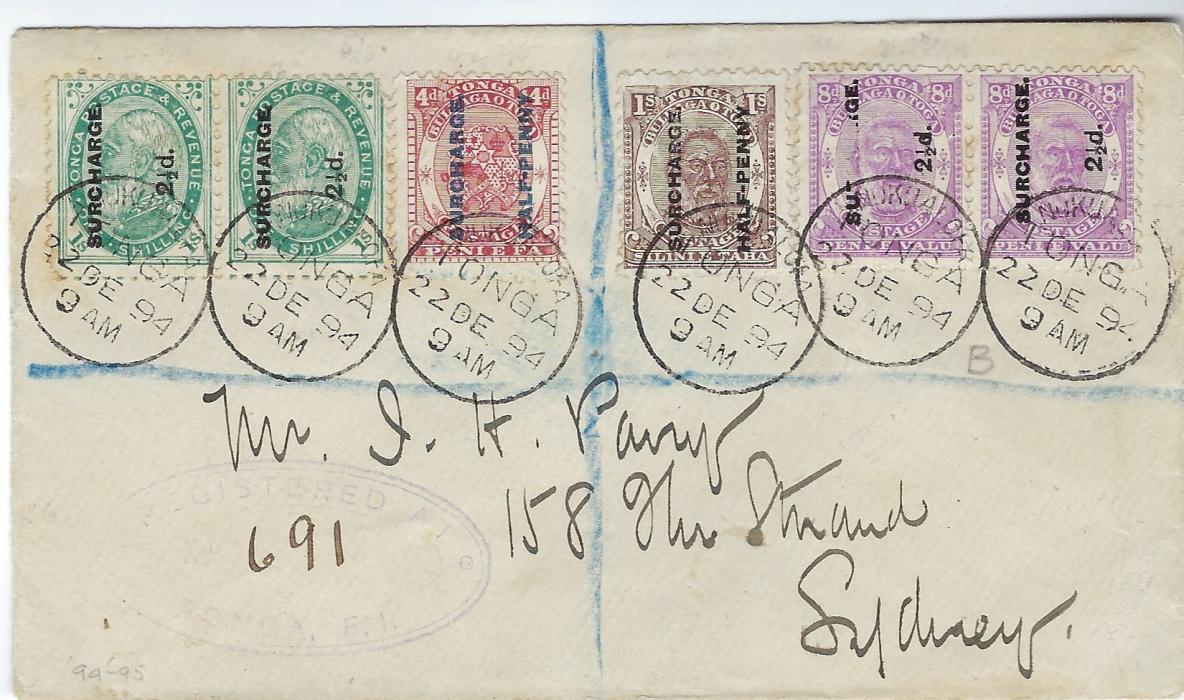 Tonga 1894 registered cover to Sydney bearing a spectacular franking of surcharge issues with pair 2 1/2d. on 1s., Halfpenny on 4d., Halfpenny on 1s. and pair 2 1/2d. on 8d., this last pair showing a large part of surcharge omitted on left-hand stamp, each tied by fine cds, arrival backstamp