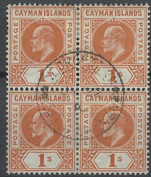 Cayman Islands 1905 King Edward VII 1s orange in used block of four with central Georgetown cancel; blue manuscript registration line on reverse otherwise fine condition.