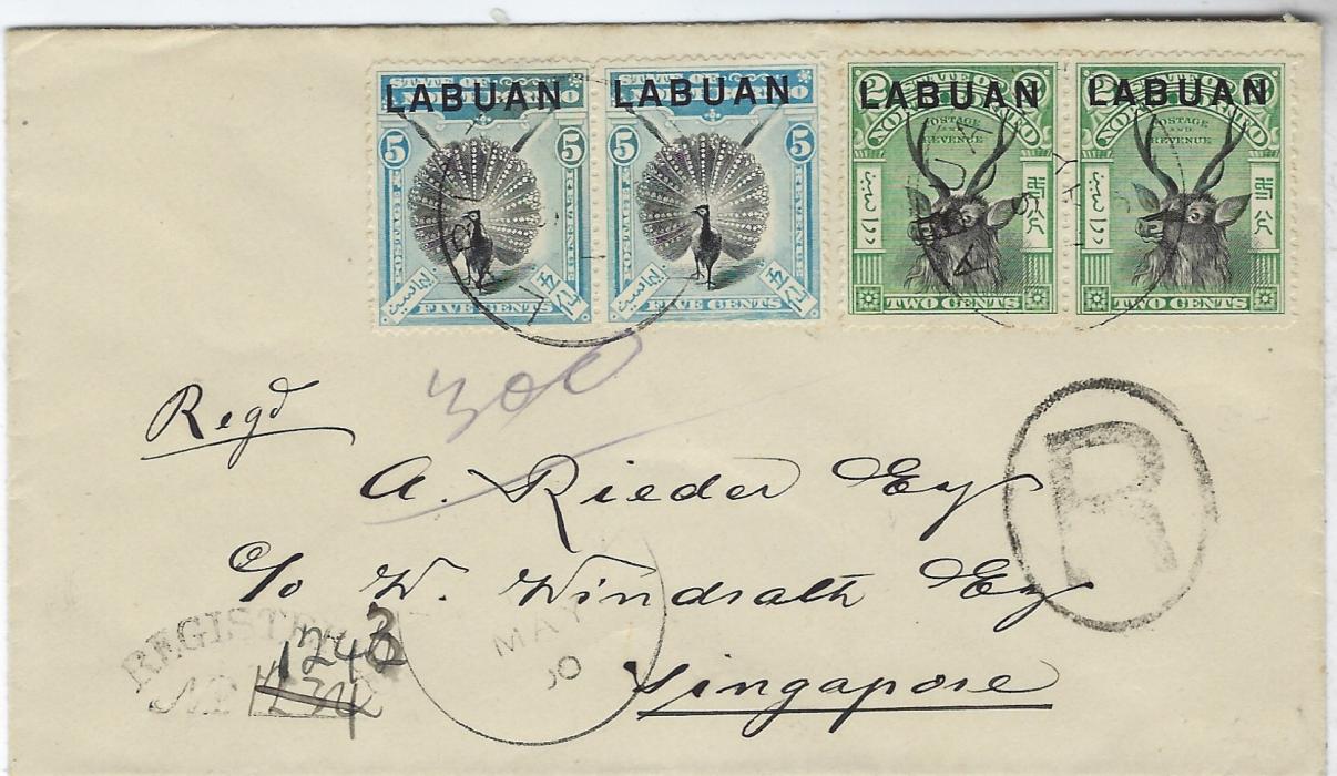 North Borneo (Labuan) 1900 registered cover to Singapore  franked 1897-1901 pairs 2c Stag and 5c Pheasant  tied Labuan cds, cursive registration handstamp with manuscript number, reverse with arrival cds.