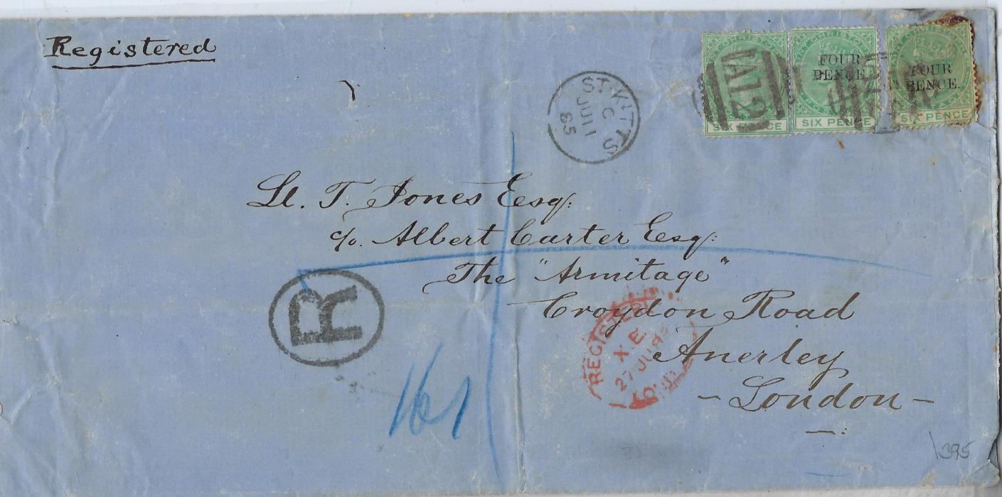 Saint Kitts & Nevis 1885 (JU 11) registered cover to London franked 6d. green and two ‘Four Pence’ on 6d.  (showing different position of surcharges) cancelled by ‘A12’ obliterators, St Kitts cds in association and London arrival. The 1/- 2d. used paying 1/- treble letter rate plus 2d. registration. Glue staining around one stamp and slight faults to envelope.
