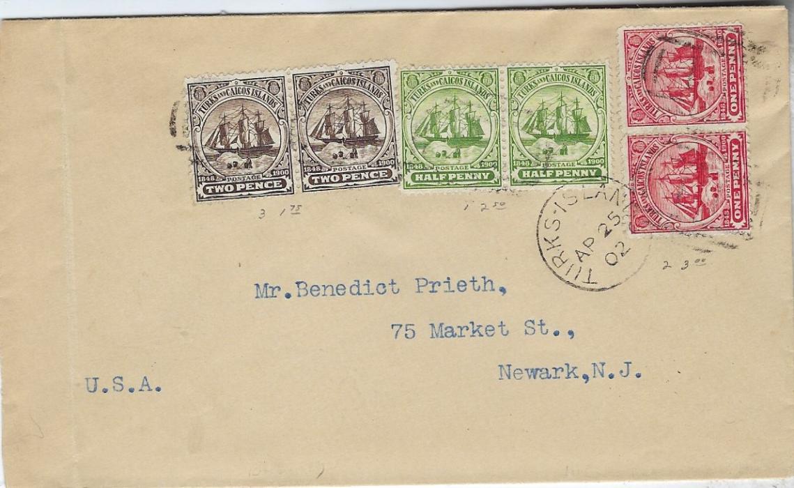 Turks & Caicos Islands 1902 (AP 25) cover to Newark, NJ, U.S.A. franked ‘Tall Ships’ ½d., 1d. and 2d. in horizontal pairs cancelled with unclear obliterators, Turks Island cds in association, New York transit and arrival backstamp; vertical crease at left side. First issue cover.