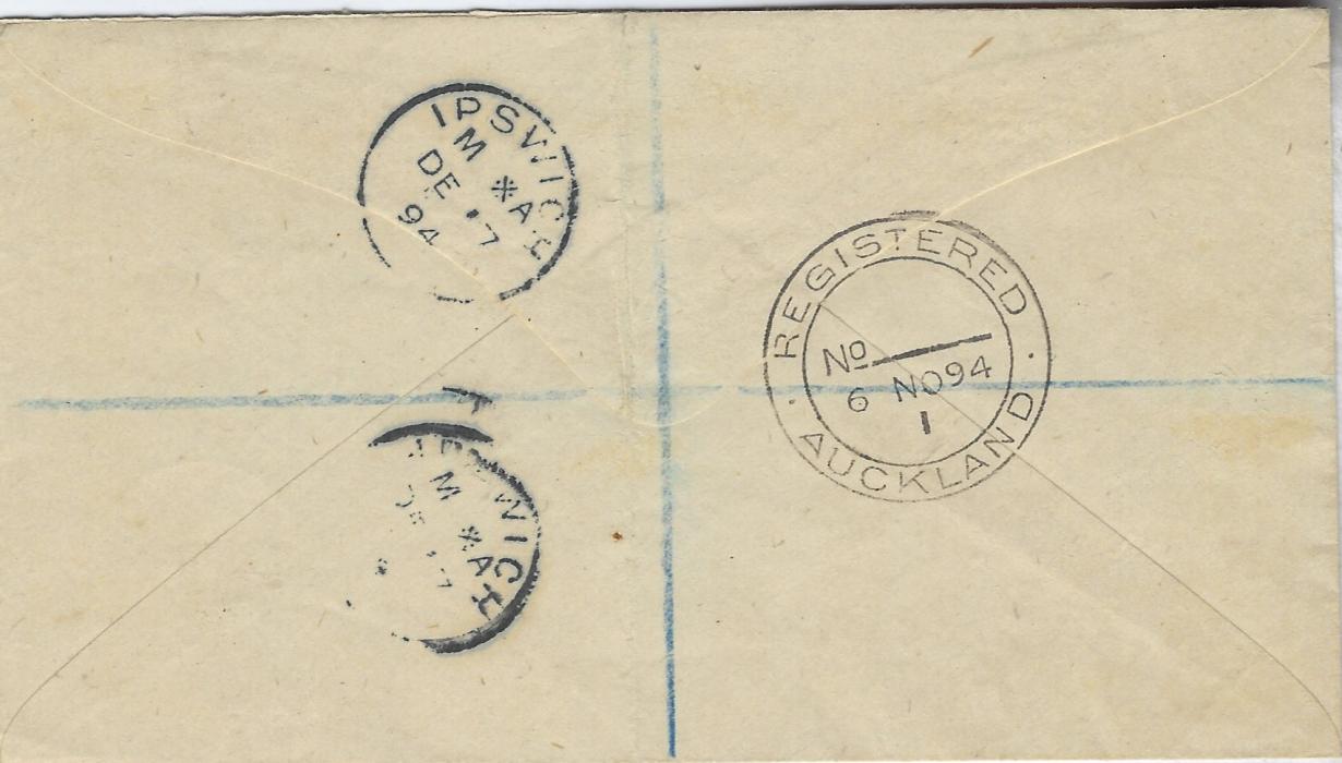 Tonga 1894 registered cover to England franked vertical pair ½d. on 1d. and two pairs of 2 ½d. on 2d. in red and in black tied by neat cds, violet oval registration at centre, London Registration transit, reverse with Auckland transit and Ipswich arrival. The 11d rate paying 6d. registration and 5d. for double weight postage. Fine and attractive cover.