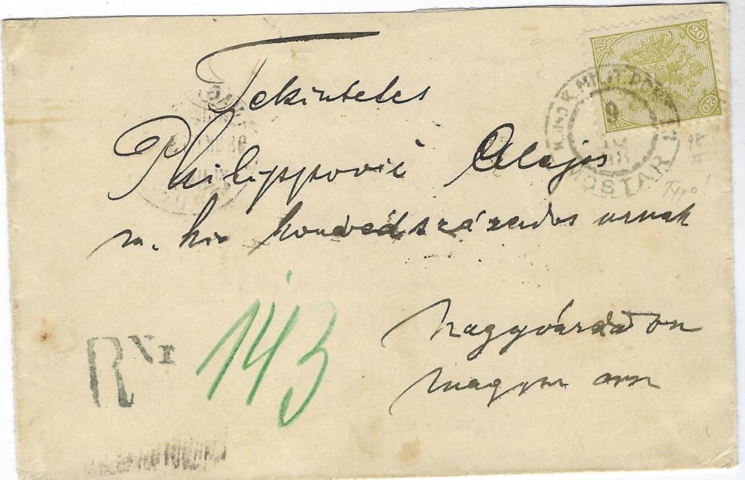 Bosnia Herzegovina 1898 registered cover to Hungary bearing single franking Typo 20k. dull green, perf 10½,  tied Mostar date stamp, registration handstamp with m/s number bottom left, Nagy-Varad arrival backstamp.
