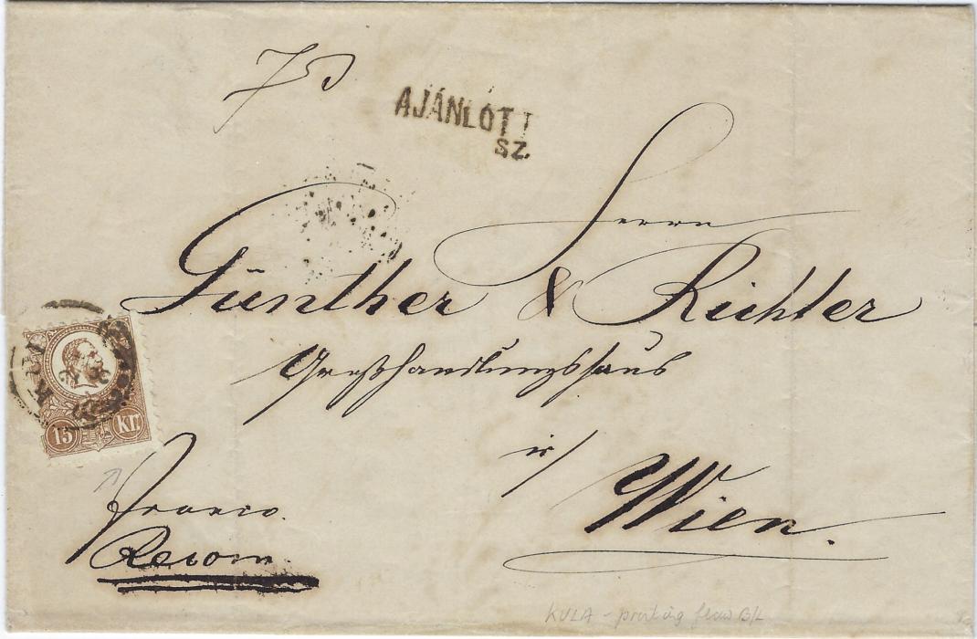 Hungary 1871 entire to Wien bearing single franking, Litho printing 15Kr. tied Kulan cds. Ajanlott/ SZ handstamp at top, arrival backstamp. fine first issue, Litho cover.