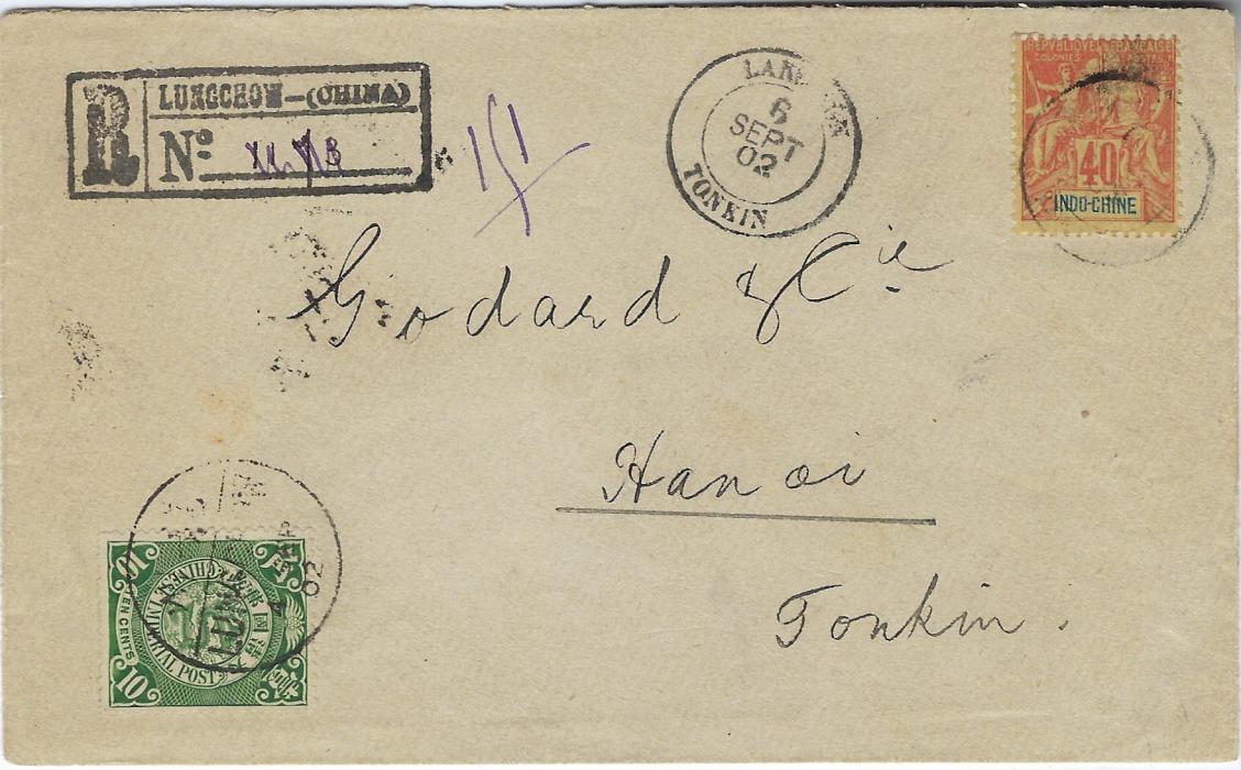 China 1902 (4 Sep) registered cover to Hanoi bearing combination franking with coiling Dragons 10c. on front and, on reverse 1c. (4) and 2c. each tied by Lungchow cds, together with Indo China 40c. tied double-ring Lannkchow cds with another clearer strike alongside, very fine Chinese registration handstamp top left. Envelope opened-out for display, a fine and scarce cover.