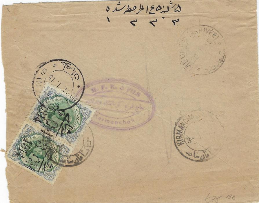 Persia 1915 cover to Meched franked on reverse pair ‘3 CH/1914’ on 26ch pair tied Kirmanchar cds, Teheran transit cds also tying one stamp and one strike on front; roughly opened at right.