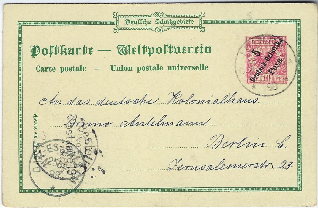 German Colonies (East Africa) 1898 5 Pesa on 10pf ‘Gruss aus Dar-es-Salam’  picture stationery card used to Berlin with Iringa/ Deutsch-/ Ost-Afrika cds of 24/5 98, with Dar-Es-Salaam transit at bottom left overstruck with arrival cds. First Day of use of Iringa postmark.