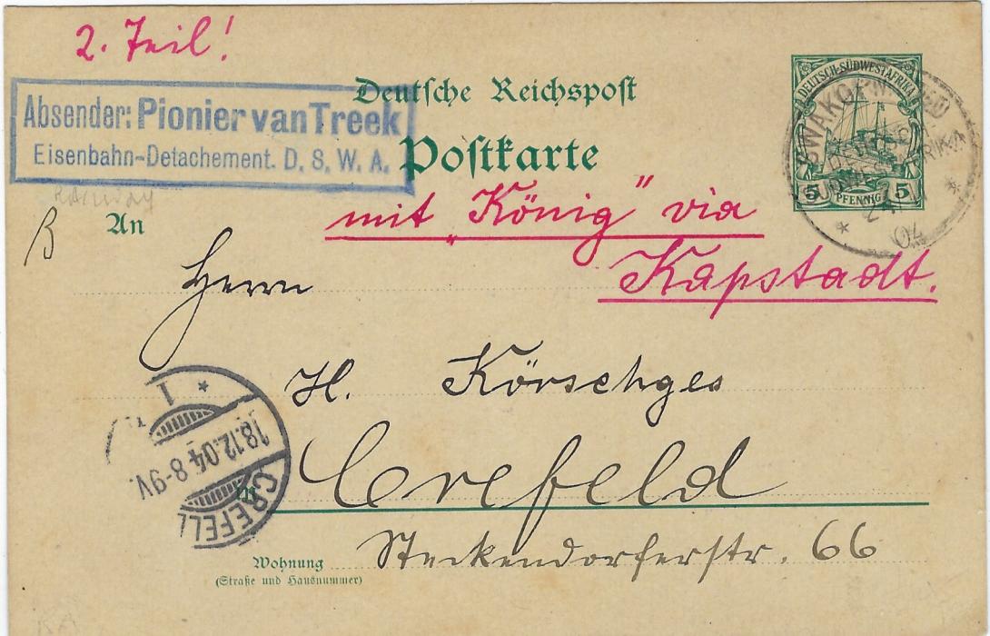 German Colonies (South West  Africa) 1904 5pf. postal stationery card to Crefeld, endorsed “mit Konig via Kapstadt” , the same red ink used  cross written over existing message, cancelled Swakopmund D-OA, at left framed senders details from Pioneer of Railways Detachment.