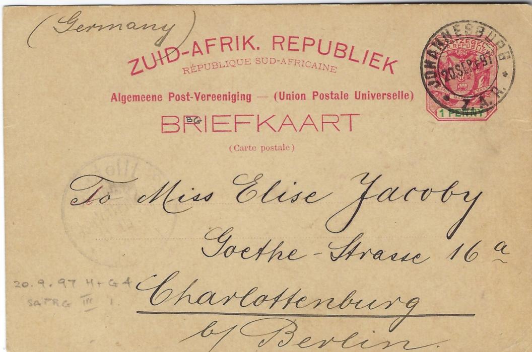 Transvaal (Picture Postal Stationery) Late 1897 1 Penny carmine and green entitled Greetings from Johannesburg  bearing four  images Dormfontein, Commissioner Street, Hospital and Mine, used to Charlottenburg, Germany; good condition.