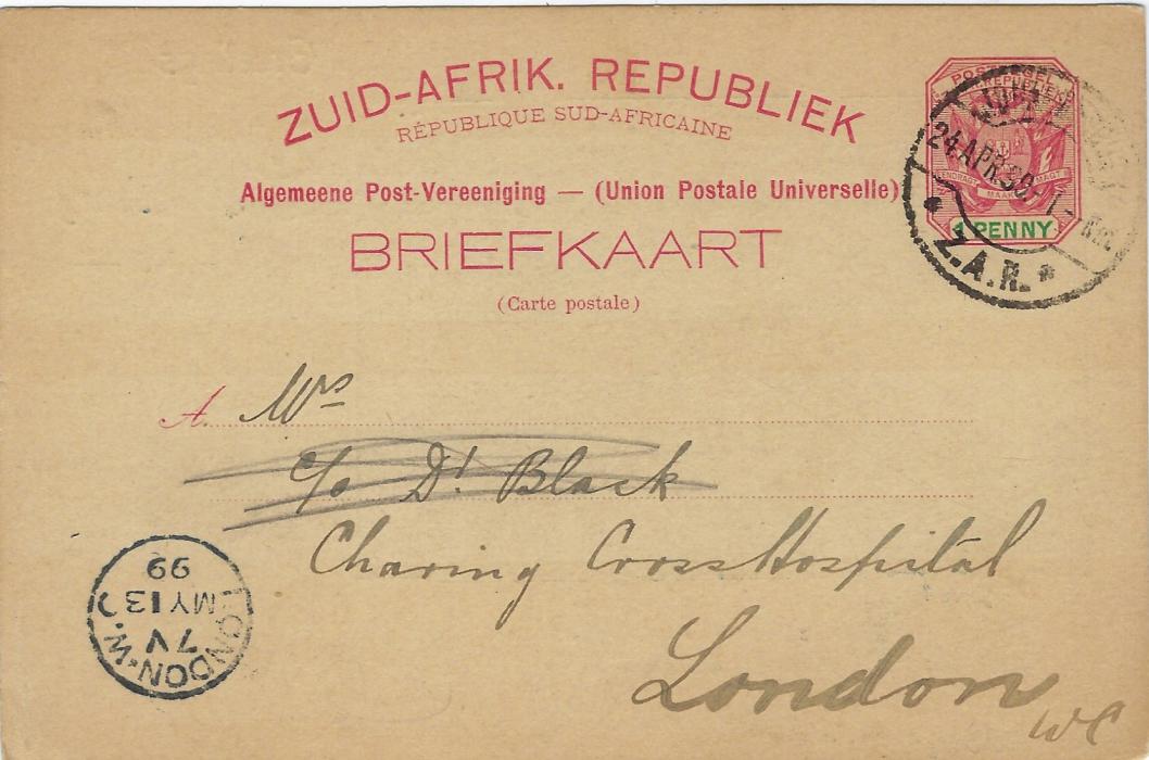 Transvaal Picture Postal Stationery) 1899 1 Penny carmine and green card entitled Greetings from Johannesburg  with image ‘Reminiscence of the 1895 Revolution’ used to London, good condition