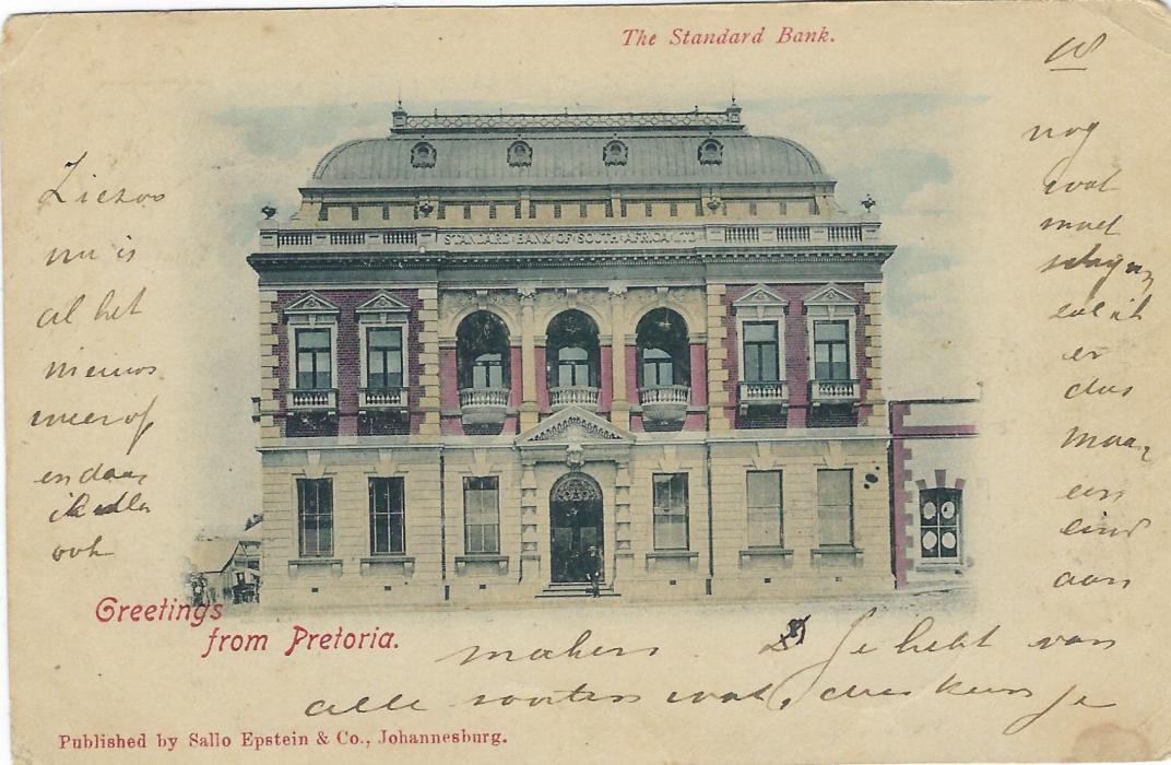 Transvaal (Picture Postal Stationery) 1899 (24 Jun)  1 Penny carmine and green card entitled Greetings from Pretoria  with image of The Standard Bank, used to Arnhem, Nederland; small stain bottom right.