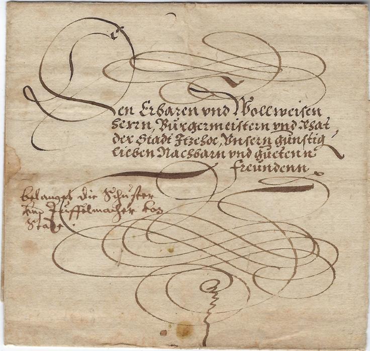 Denmark 1608 (pencil dated) outer letter sheet, honorific addressed cover to Itzehoe, Schleswig Holstein, addressed to the Burgermeister and councillor of Itzehoe with manuscript below “Belanget die schuster (Cobblers) und tuffelmacher von Stade”. Reverse with large seal with date at base 1590. One side flap missing not distracting from a fine early cover.