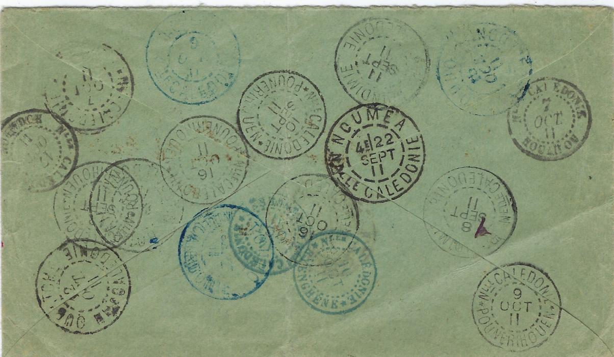 New Caledonia 1911 (27 Aout) local 10c. cover from Noumea to Kone, redirected with eighteen cancels on reverse with dates to 16 Oct, some repeating themselves like Pounerihouen of 10/9 and 16/10; central vertical filing crease.
