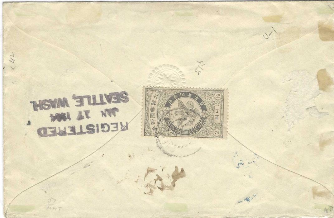 Korea 1904 unclearly dated registered cover to Boston, USA, franked 1896-98 Later Printing 10p. blue in horizontal strip of five plus 10ch. Falcon tied Chemulpo cds, registration handstamp at base, reverse with 2rin Falcon used as seal and cancelled, three-line Registered Seattle transit cancel of Jan 17 1904. Fine and rare.
