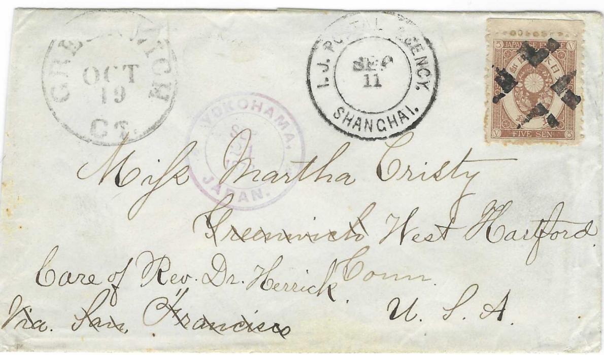 China (Japanese Post Offices) 1878 (Sep 11) cover to Conn., USA franked 1876-86 Koban 5 sen  brown top marginal cancelled by crossroads cork,  I.J. Postal Agency Shanghai cds alongside, good strike of rare double-ring violet Yokohama Japan of Sep 21, redirected upon arrival with Greenwich cds top left, reverse with San Francisco transit (Oct 11). A fine cover.