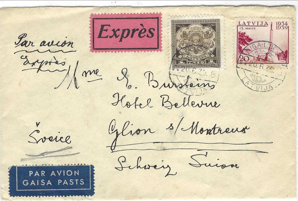 Latvia 1939 (20.6.) air express cover  to Switzerland  franked 1939 Anniversary 20s and Seal 1L each tied by Riga cds, Expres label alongside; part of backflap missing.