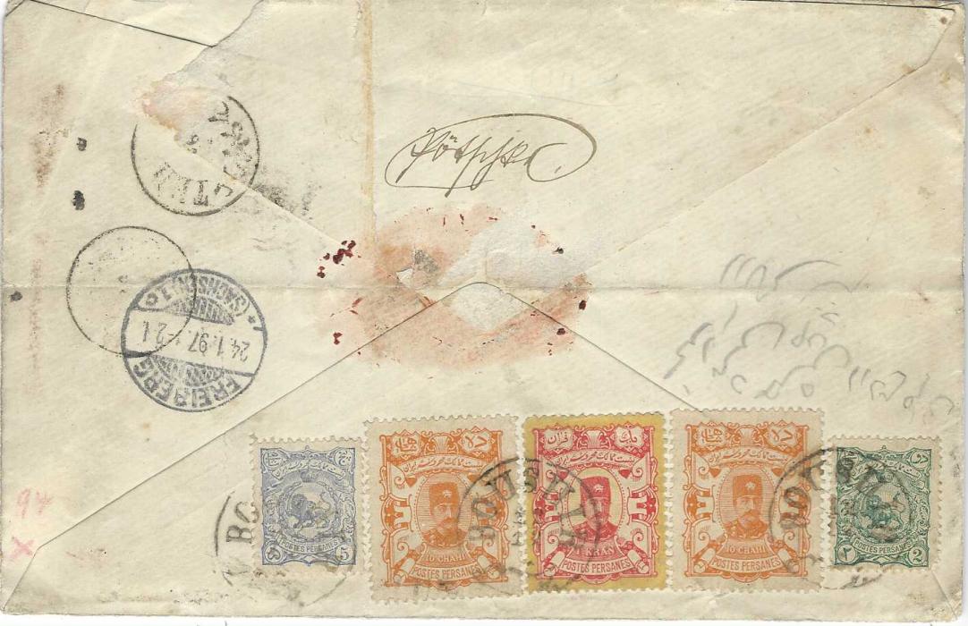 Persia 1897 registered cover to Freiburg franked on reverse with mixed issue franking with 2ch and 5ch ‘Lion’ plus Nasr-ed-Din Shah 20ch. (2) and 1Kr. tied Boushir cds, Teheran transit and arrival cancel; an overfranked cover with vertical and horizontal creasing and a little grubby.