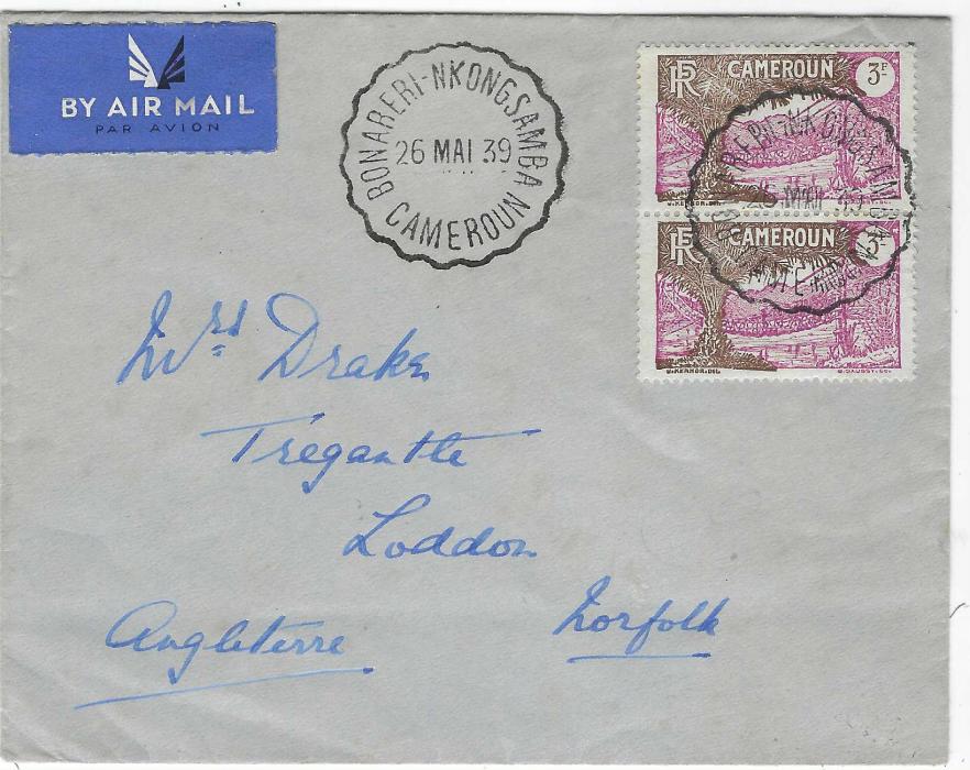 Cameroun 1939 (26 Mai) airmail envelope to Norfolk franked vertical pair 3f. tied by multi-faceted BONABERI NKONGSAMBA CAMEROUN TPO date stamp with a further very fine strike to left.