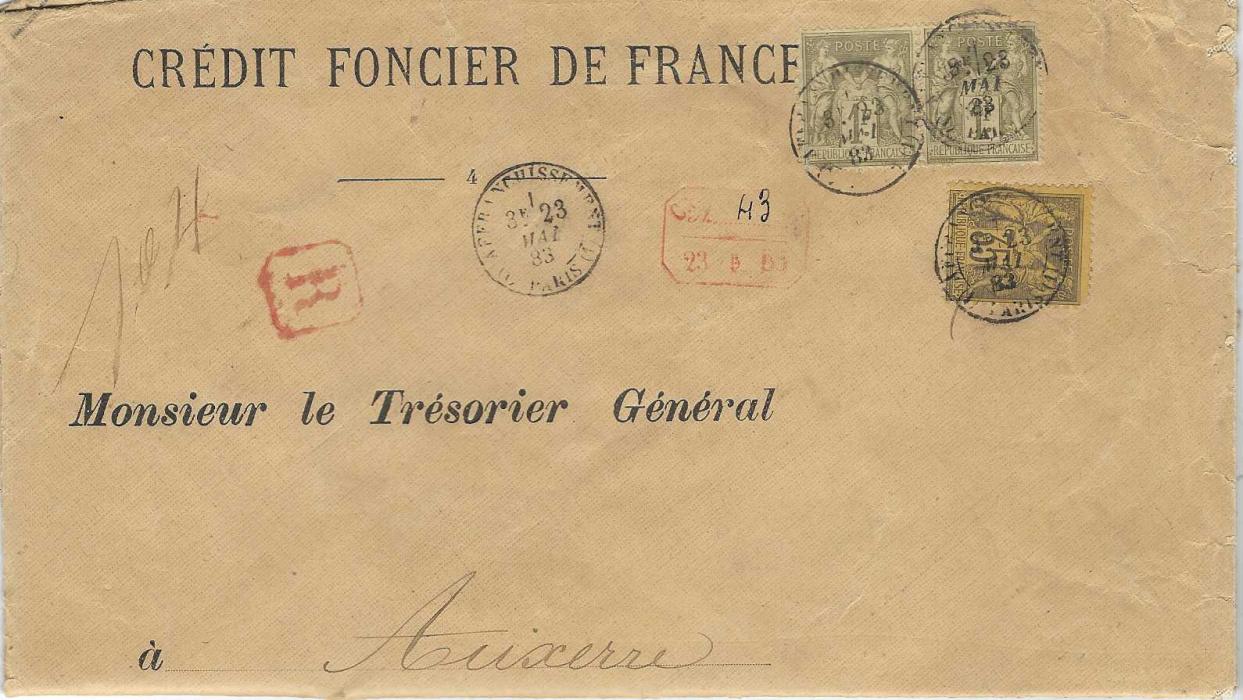 France 1883 (23 Mai) large registered printed envelope that has been folded down for exhibiting purposes, to Auxerre franked ‘Sage’ 35c. and pair 1f. olive tied Affrancissement Paris cds, red framed ‘R’ and framed handstamp, arrival backstamp. The 1f. olive  with damaged bottom left corner, type II, first day of issue.