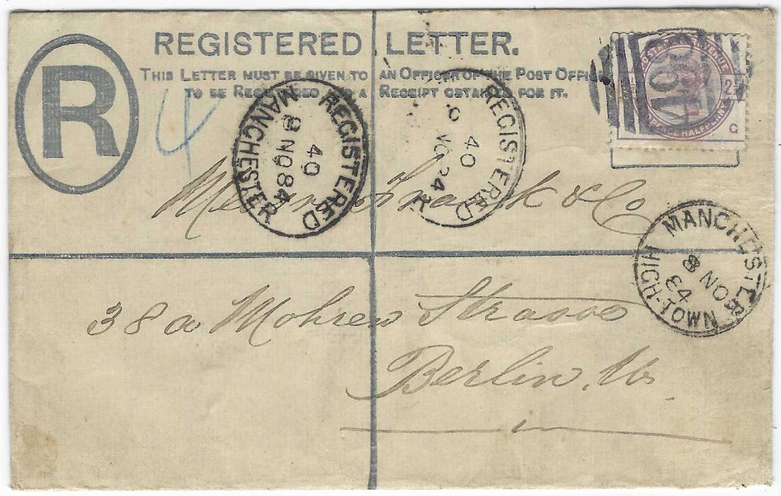 Great Britain 1884 2d. registered postal stationery envelope to Berlin, uprated 2 1/2d. lilac tied 498 numeral with Manchester High-Town cds in association, Registered Manchester and London date stamps, arrival backstamp; some damage to stamp image