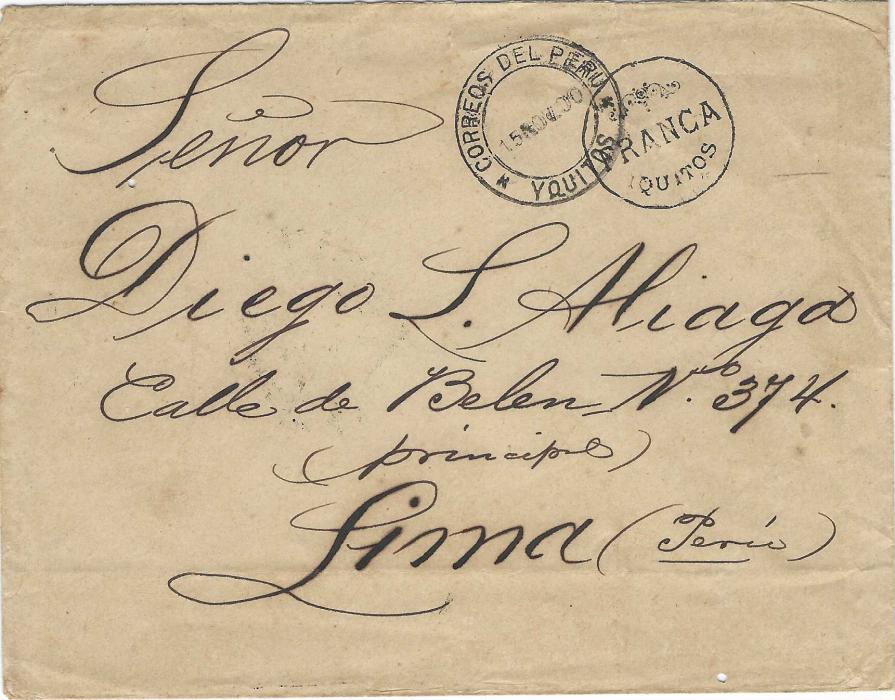 Peru 1900 (15 Nov) stampless envelope to Lima with ornate circular FRANCA/ Iquitos handstamp, Yquitos cds alongside, arrival backstamp. Light filing creases and three worm holes.