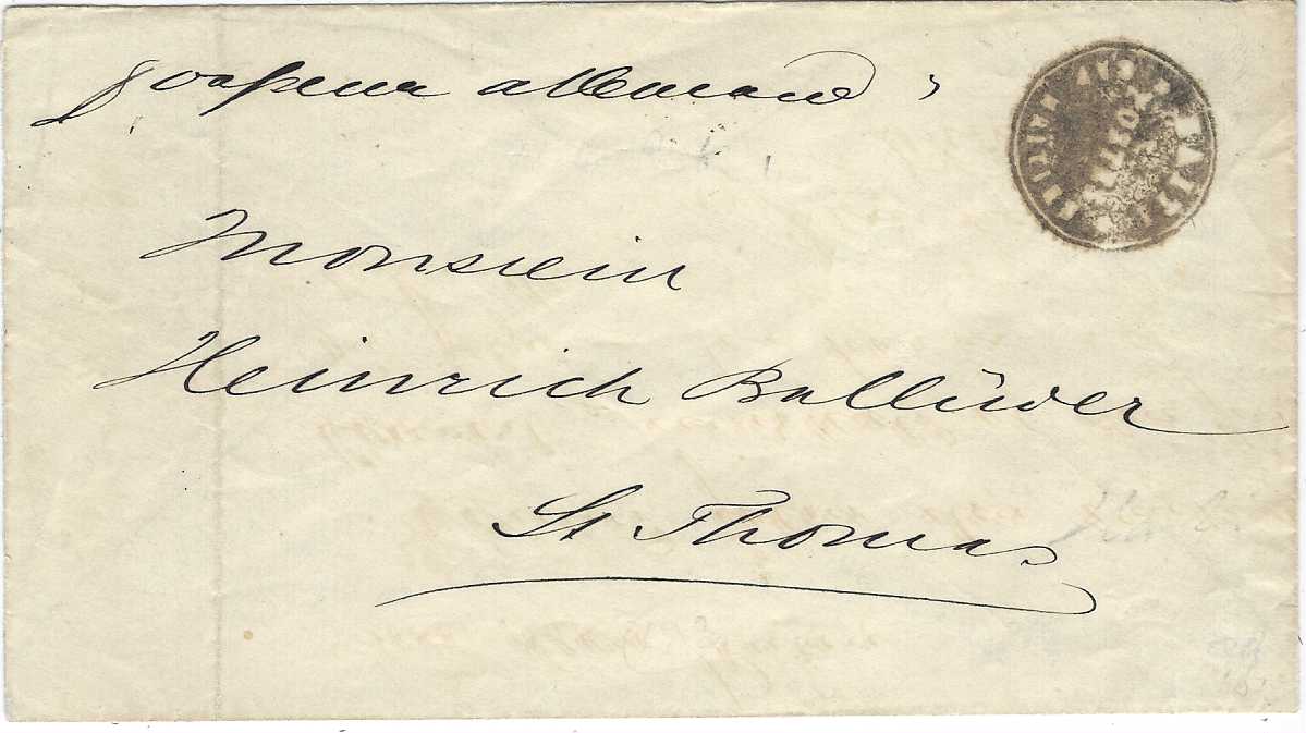 Haiti 1889 stampless envelope to St Thomas showing good strike of negative seal of Cap Haitien, light filing crease at left otherwise good condition. This cancel was used between March and October 1889 only during the short lived Republique Septentrionale.
