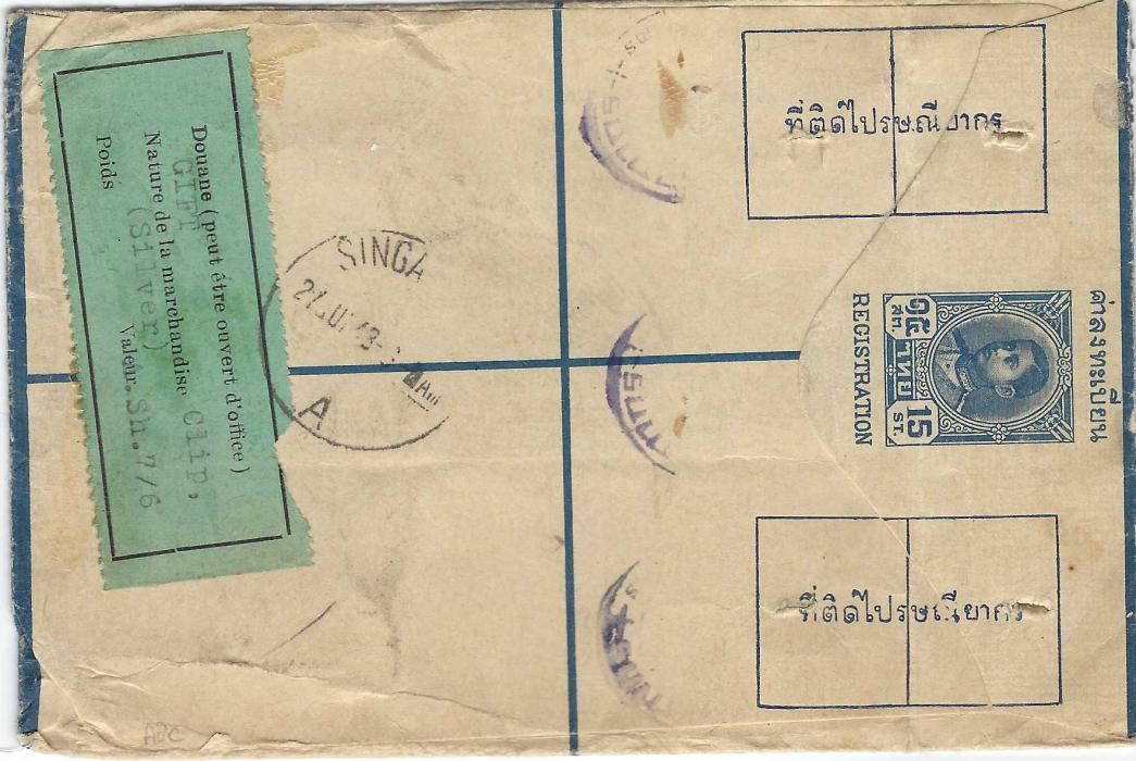 Thailand 1948 15s registration stationery to Melbourne, Australia additionally franked with pair of 80s., endorsed “Sample Mail”, green label applied after folding over the envelope and tied three violet cachets with two punch holes, further green label stating contents as ‘Silver clip’, this tied by a Singapore transit; unusual.