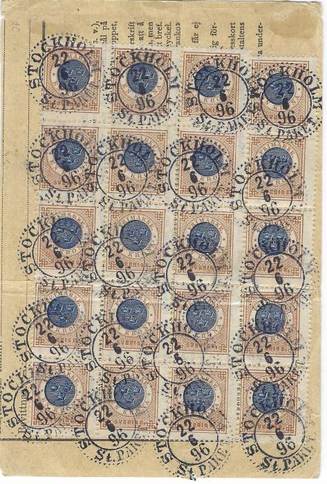 Sweden 1896 (22/6) reduced parcel card Kalmar franked on front 1891 Oscar 5o. and 1886 1Kr. vertical strip of four and on reverse a further block of 10 and two strips of five, all tied by dotted circle Stockholm St. Paket date stamps; horizontal and vertical creases affecting some of the stamps otherwise fine and spectacular.