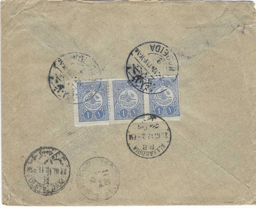 Yemen (Ottoman Empire) 1912 (27.2.) registered cover to Versailles, France franked on reverse 1908 Turkish 1pi. strip of three tied by bilingual Hodeida 2 date stamp, Alexandria and Port Said transits and arrival cds, fine U.P.U. Turquie registration handstamp with manuscript number on front. Rare registered envelope.
