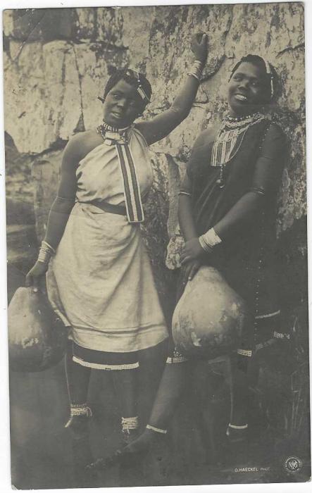 German Colonies (Kamerun) 1903 3pf Yacht photographic picture stationery card with image  of two local women with water gourds, c.t.o. in Berlin with Duala cds; top left corner crease.