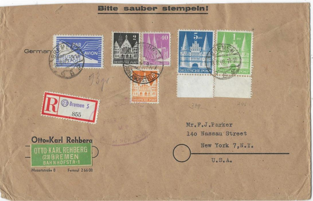 Germany (American and British Zones) 1948 (19.8.) registered airmail cover to New York franked Buildings 2pf., 8pf., 10pf.,1DM and 5DM plus blue air label, the three small values tied Hamburg Auslandsstelle cds, high value and label by Bremen 5 cds, New York customs handstamp and arrival backstamps; envelope slightly reduced at top.