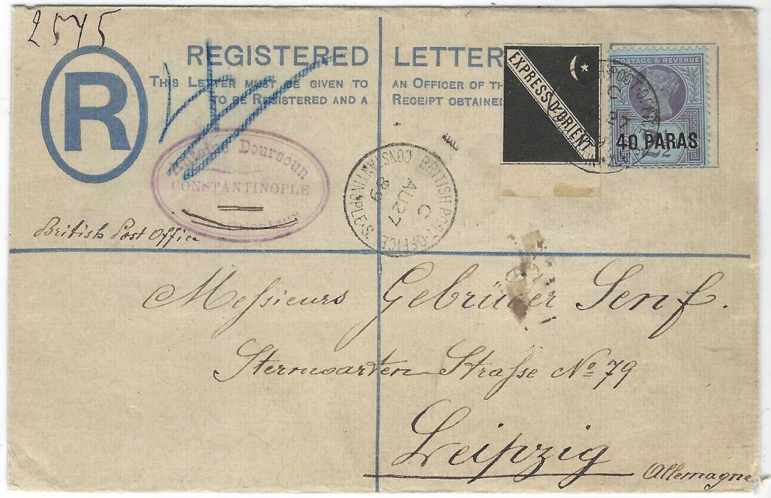 British Levant (Express D’Orient) 1889 (AU 27) registered formula stationery envelope to Leipzig franked ’40 PARAS’ on 2½d. plus rare black label tied by single BRITISH POST OFFICE CONSTANTINOPLE index C cds, arrival backstamp and with selvedge of stamp used to additionally seal envelope; a fine example.