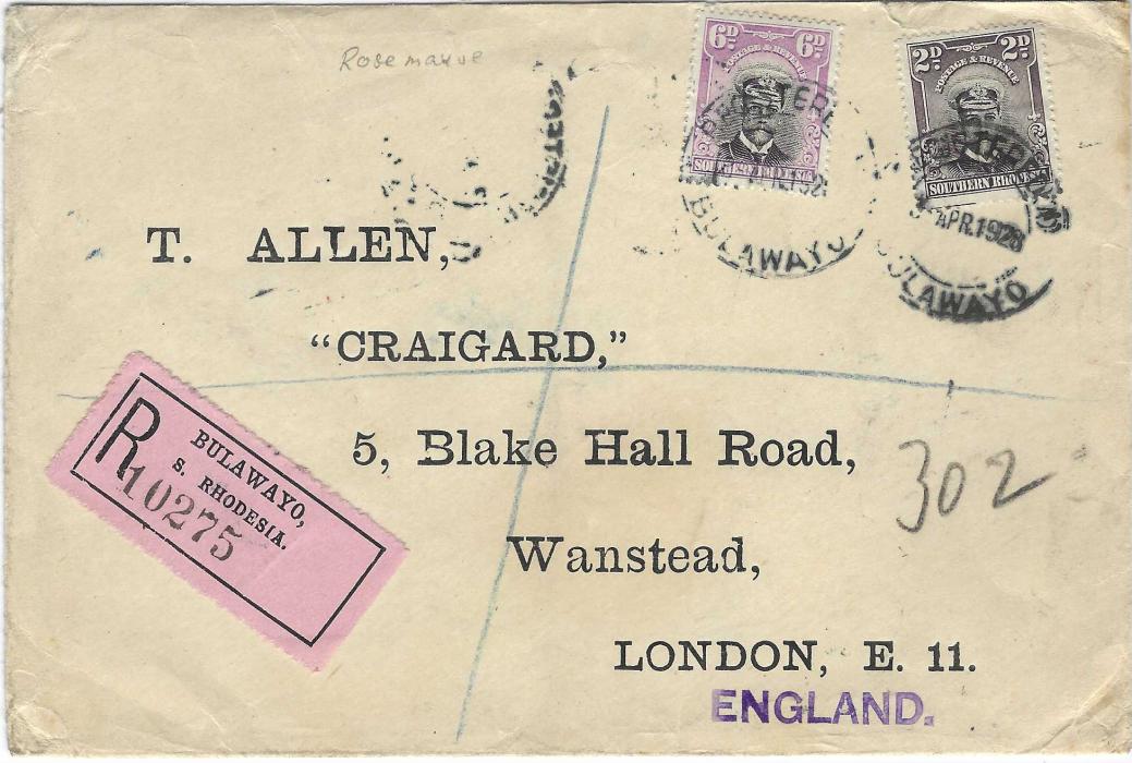 Southern Rhodesia 1928 registered printed envelope to London franked ‘Admiral’ 2d. and 6d. tied by Registered Bulawayo date stamps, pink registration label at left, reverse with further despatch, red hooded London date stamp and Leytonstone cds; a little roughly opened at top.