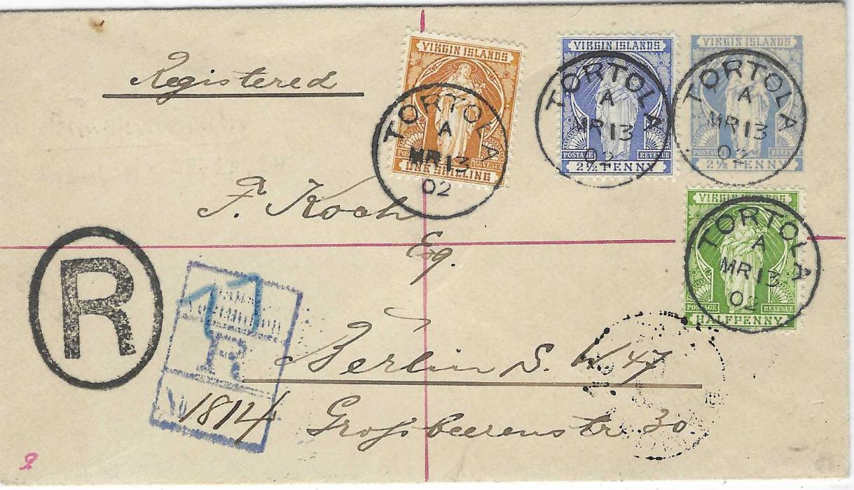 Virgin Islands 1902 (MR 13) 2½d. postal stationery envelope registered and uprated with ½d., 2½d. and 1/-  ‘Madonna’ to  Berlin tied TORTOLA cds, black ‘R’ in oval handstamp with blue crayon manuscript number which is overstruck with blue Danish West Indies registration handstamp with black manuscript number, St Thomas transit backstamp and arrival cds (9/4)