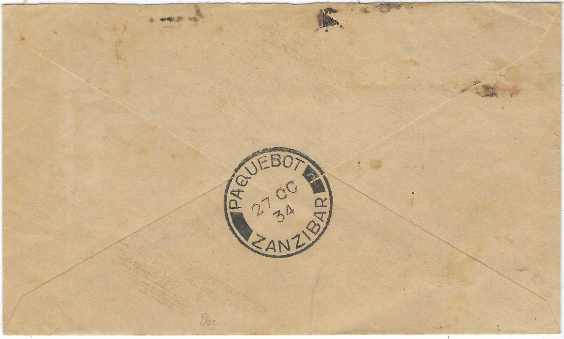 Zanzibar 1934 stampless incoming envelope cancelled on reverse PAQUEBOT ZANZIBAR (27 OC), circular framed ‘T’ handstamp overstruck with Postage Dues 1926-30 18c. black/orange and 1930-33 rouletted 5 2c. black/salmon vertical pair and a 3c. black/rose tied by three REG ZANZIBAR datestamps of 8 NO; some glue staining, fine mixed issue franking