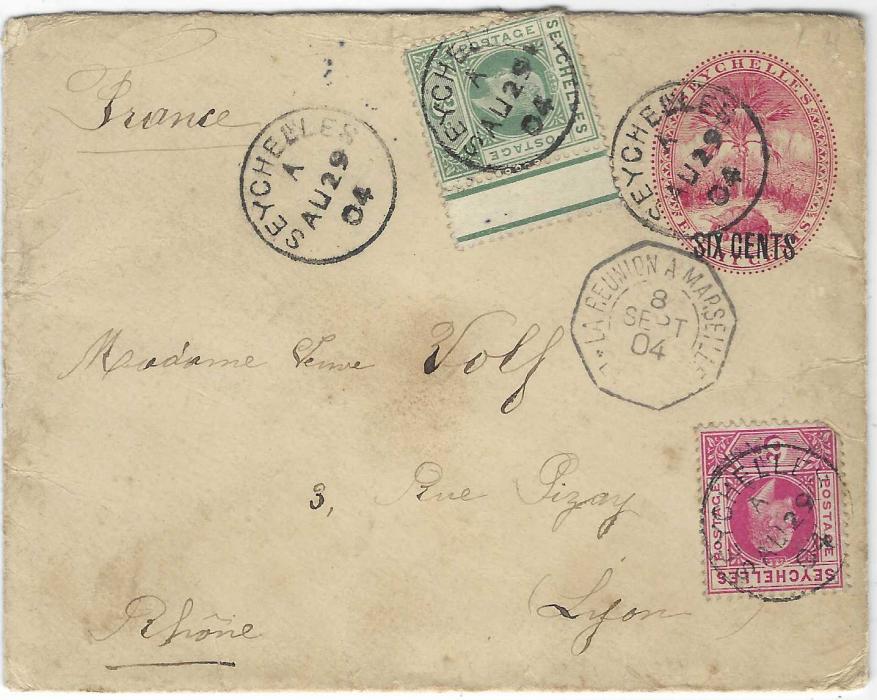 Seychelles (Postal Stationery) Two 6c. on 8c. size A envelopes, 1904 uprated used to France paying correct 15c foreign rate, La Reunion a Marseilles maritime cancel, plus 1902 envelope of same size to Mauritius paying 6c Imperial Penny Post, cancelled Seychelles cds showing inverted ‘A’; first envelope some staining