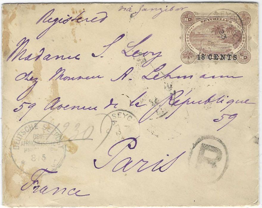 Seychelles (Postal Stationery) 1902 (AP 23) 18c on 30c registered stationery envelope to Paris uprated on reverse four 2c. and four 4c., paying the double foreign letter rate to Paris plus 12c registration, reverse with Mombasa transit of 29 AP, endorsed at top “via Zanzibar” in apparent different script, at bottom left Deutsche Seepost Ost Afrikanische Hauptlinie with uncertain code letter; some staining on front not detracting from good German maritime commercial cover.