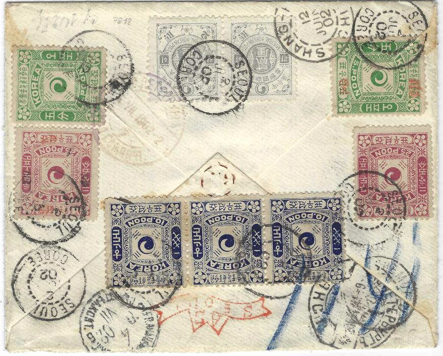 Korea 1902 (2 June) AR registered envelope to St Petersburg, Russia which has been opened-out for display, the front bears 1900-03 New Currency 2ch., 5ch., 10ch., 15ch. (2), 20ch. pair, the reverse with 2re pair and 1895-98 2nd printings 5p., 10p. horizontal strip of three and a 25p. plus red handstamped 5p. 2nd printing and 1899-1900 1p on 25p red overprinted 25p., each stamp cancelled Seoul cds, the front bears registration handstamp and framed ‘A R’ , reverse with Shanghai transit and arrival cds; a couple of light stains not detracting from a remarkable cover.