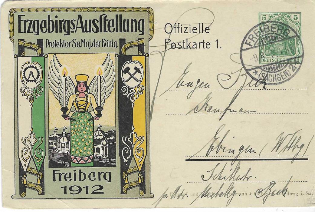Germany (Picture Stationery) 1912 5pf Offizielle Postkarte 1 titled ‘Erzebirgs Austellung’ Freiburg depicting wooden Christmas Angle with candles, the other side with full image of Freiburg; light corner creasing and bumps.