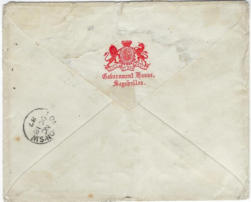 Seychelles (Mauritius Used In) 1887 (28 SP) envelope, with red Government House crest on reverse, to London franked 1883 16c. vertical pair tied ‘B64’ obliterators, Seychelles cds alongside with reverse ‘C’ index; arrival backstamp with backflap torn on opening.