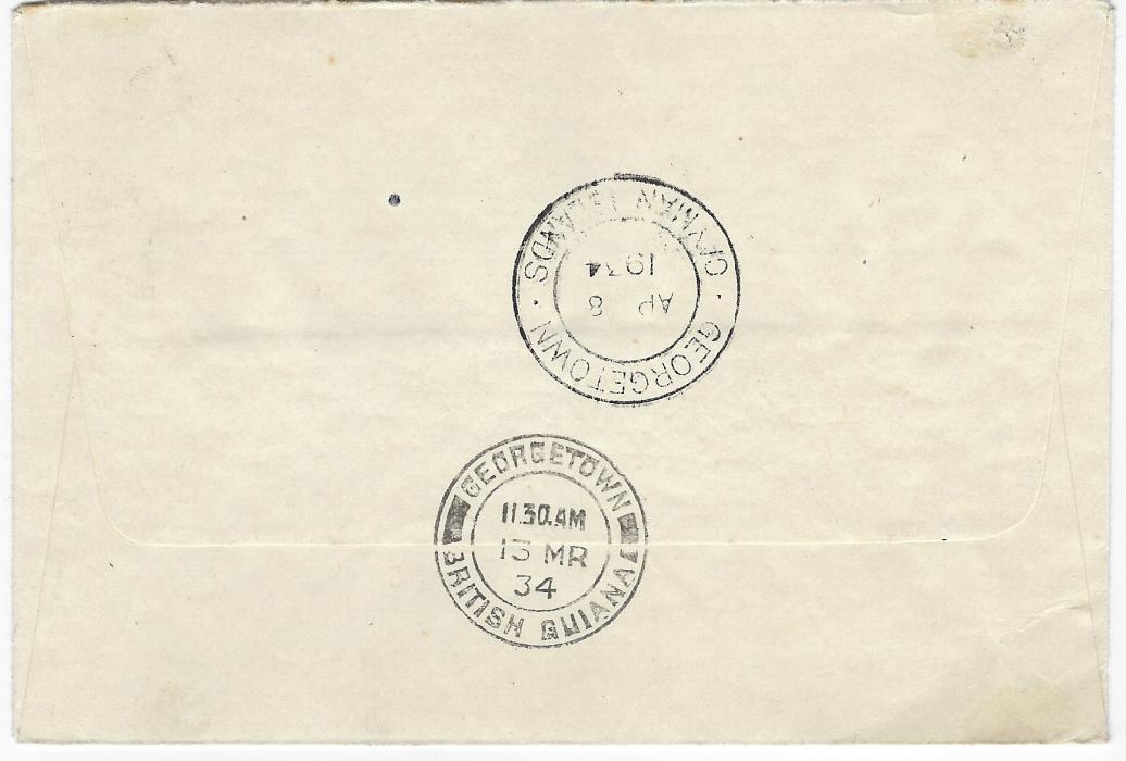 Cayman Islands 1934 (AP 8) ‘Panton’ envelope incoming from British Guiana franked Centenary  1c. pair tied New Amsterdam cds and showing two different special handstamps promoting Waterfall visit and Buying Demerara Rice, ‘T.’ in circle handstamp applied on despatch with manuscript “2d” , additionally franked 2c. Centenary tied double-ring Georgetown date stamp, repeated at base and on reverse where Georgetown British Guiana also appears. Fine condition.