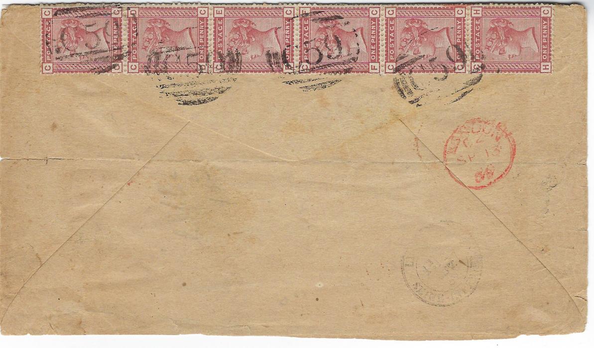 Haiti (British Post Office) 1880 (AU 25) opened-out envelope to Havre franked Great Britain  1870 1½d. and 1880 1d Venetian Red vertical strips of 6 and 3 plus a single, two stamps missing from the front top right (would originally have been a block of 12), cancelled by C59 obliterators, fine red JACMEL PAID, Calais entry cds at left, reverse with London transit and arrival cds. Envelope opened out for display, a most unusual franking.