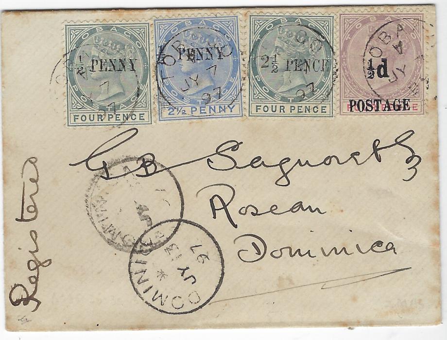 Tobago 1897 (JY 7) small registered envelope to Roseau, Dominica franked group of four 1886 Provisional Surcharges tied by Tobago cds with inverted index A, Dominica arrival cancels below (JY 13); a little roughly opened on reverse, some slight toning, still a very attractive and scarce usage. Ex. Besancon.