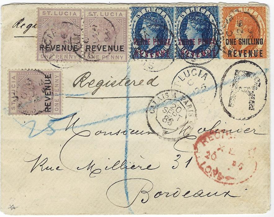 Saint Lucia 1886 (AU 25) registered cover to Bordeaux franked 1882 perf 12 ‘THREE PENCE/ REVENUE’  dee blue pair and ‘ONE SHILLING/ REVENUE’ plus 1884-85 1d dull mauve (3) tied by St Lucia cds, large ‘R’ in oval, red London transit, Calais a Paris tpo, arrival backstamp. A rare three colour franking and usage. Ex Besancon.