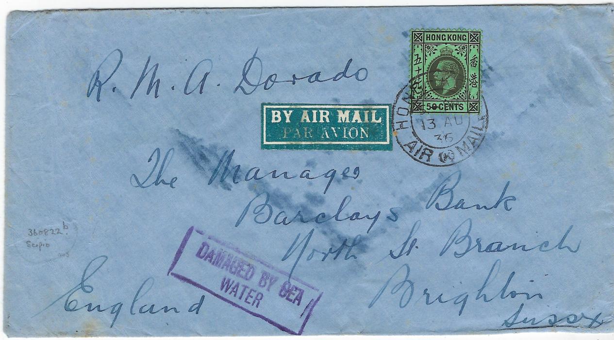 Hong Kong (Crash Mail) 1936 (13 AU) airmail cover to Brighton franked 50v. tied  Air Mail cancel, carried by R.M.S. Dorado to Malaya to connect with Imperial Airways liner Scipio that crashed in the sea off Crete during a storm, bearing framed vioet DAMAGED BY SEA/ WATER handstamp; some water staining as to be expected.