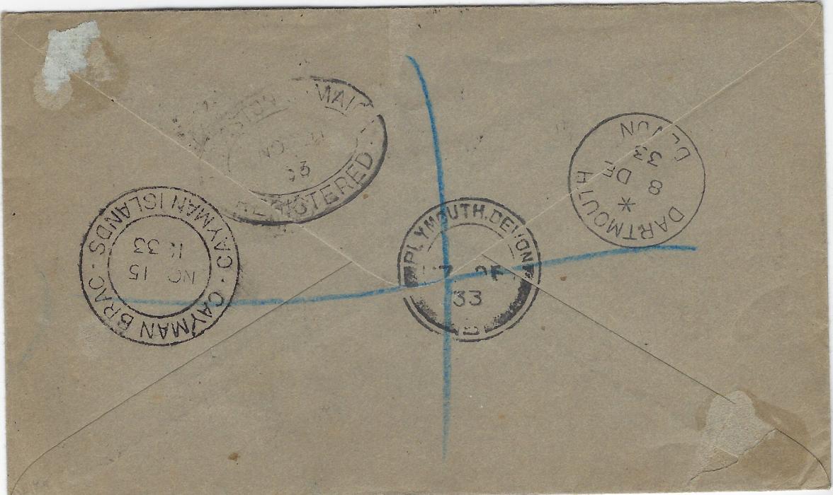 Cayman Islands 1933 (NO  15) registered cover to England franked 1932 Centenary ¼d. pair, ½d., 1½d. and 2½d. tied Cayman Brac cds, violet registration handstamp bottom left, reverse with Kingston Jamaica and Plymouth transits and Dartmouth arrival.