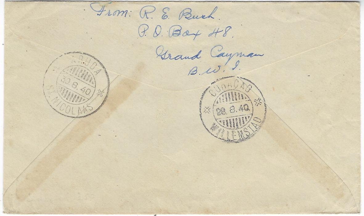 Cayman Islands 1940 (AU 2) cover to San Nicolas, Aruba, Netherland West Indies bearing single franking 2½d. tied Georgetown double ring cds, with to left ‘Opened by Censor’ apple green label with stop (a late date), reverse with Curacao transit (28.8.) and arrival cds (30.8.). Some glue staining around label, scarce 