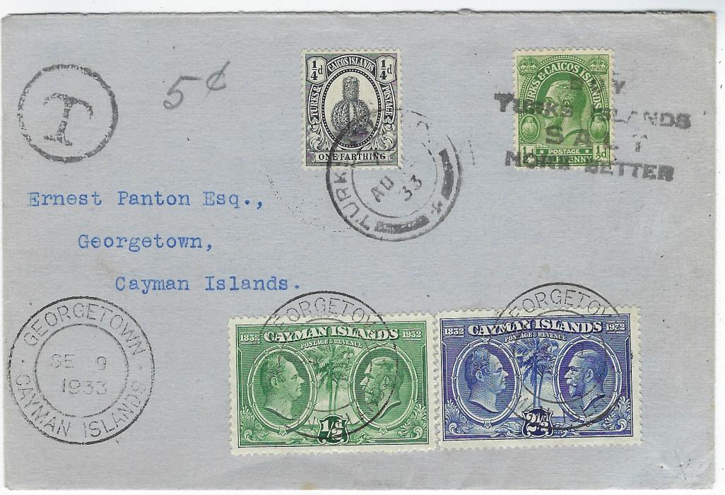 Cayman Islands 1933 (AU1 5) underfranked ‘Panton’ envelope from Turks & Caicos Islands  with ¼d. and ½d. the former tied cds and the latter with four-line SALT slogan, black circular framed  ‘T’  with manuscript “5c” ,on arrival 1932 Centenary ½d. and 2½d. added and tied Georgetown cds, repeated at left and on reverse, which also has fine framed slogan; fine condition.